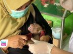 Vaksinasi gratis ini digelar bertepatan dengan momen memperingati Hari Rabies Sedunia 2025.
